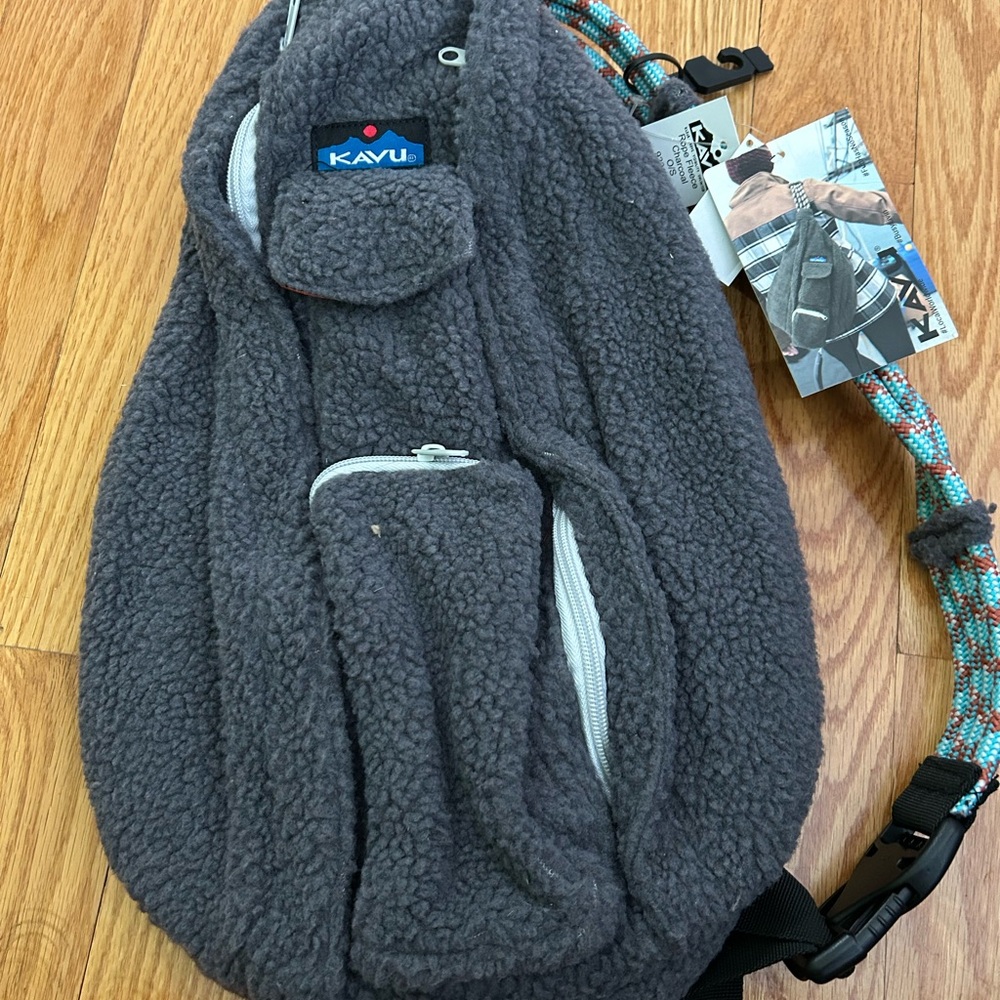 Kavu Fleece Sling Pack in Charcoal Gray with Multicolor Strap
